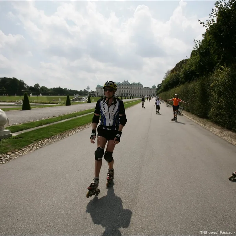 Skaters on a park path in Vienna